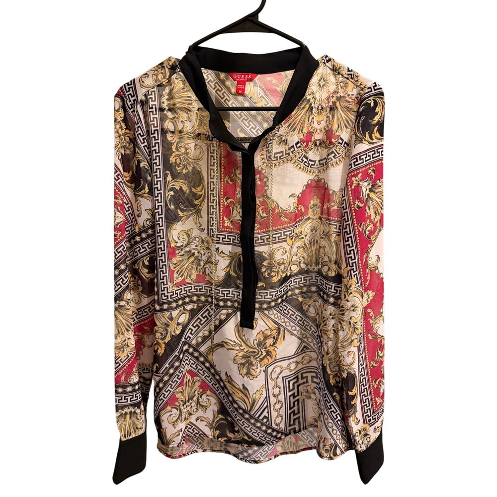 GUESS by Marciano blouse features a vibrant chain